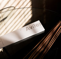 The Aviles Incense pack on a shadowy background. 