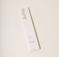 The Aviles Incense pack on a cream background. 