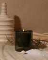 Yield 6oz Double Wall Coquina Candle in a living room setting.