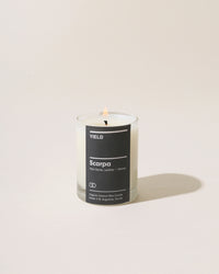 Yield 6oz Scarpa Candle on a cream background.