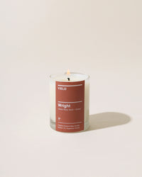 Yield 6oz Wright Candle on a cream background.