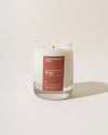 Yield 8oz Wright Candle on a cream background.