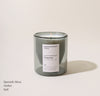 Yield 6oz Coquina Candle on a cream background.