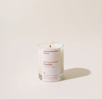 Yield oz Castillo Candle on a cream background.