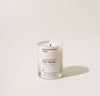 Yield 2.5oz Palo Santo Candle on a cream background.