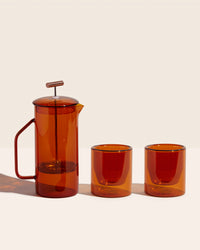 The Yield Glass French Press & 6oz Double Wall Glass Set in Amber.